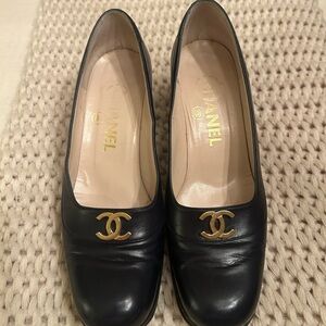 CHANEL Black Leather Heels with Gold Logo